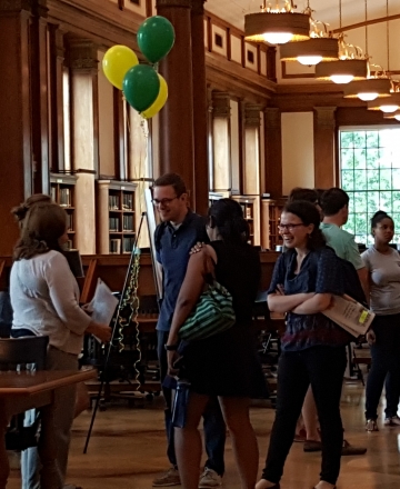 Students with Librarian in Stamps Reading Room at Open House